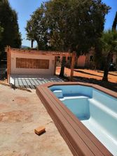 Construcciones y Reformas Puchaicela terraza con piscina